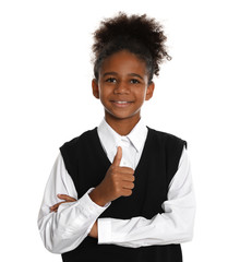 Happy African-American girl in school uniform on white background