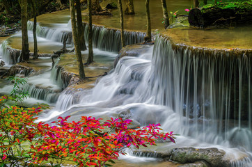  amazing of huay mae kamin waterfall in colorful autumn forest at Kanchanaburi, thailand