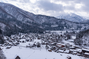 The overlooking view of Shirakawa-go after snow falling and soak in the sunshine, winter in Japan.