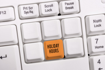 Conceptual hand writing showing Holiday Hours. Concept meaning employee receives twice their normal...