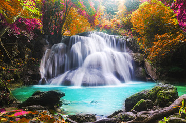 Fototapeta na wymiar huay mae kamin waterfall in colorful autumn forest at Kanchanaburi, thailand