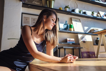 Model with perfect sensual figure pose in home interior.