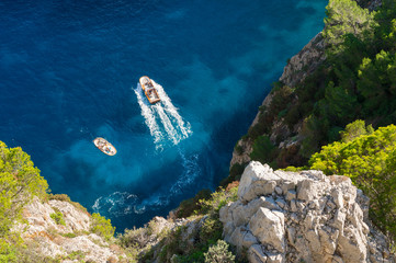 Scenic view of the dazzling Mediterranean blue waters from the dramatic clifftop mountain coastline of the island of Capri, Italy 