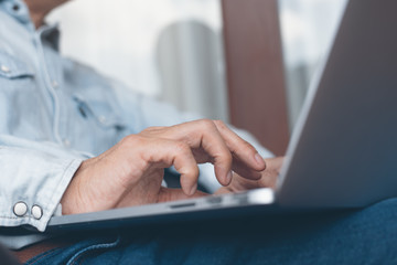 Working on laptop computer