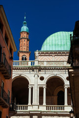 View of Basilica Palladiana marble arches (16th-17th century) and old Bissara Tower in Vicenza historic center