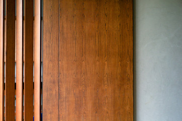 Abstract texture and background of sliding wooden door and cement wall