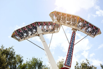 Carousel in a summer city park.