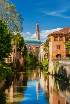 Wonderful renaissance Basilica Palladiana seen from River Retrone with reflection in Vicenza historic center