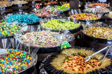 Assortment colorful gummy candies at market 