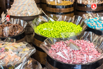 Assortment colorful gummy candies at market 