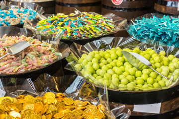 Assortment colorful gummy candies at market 