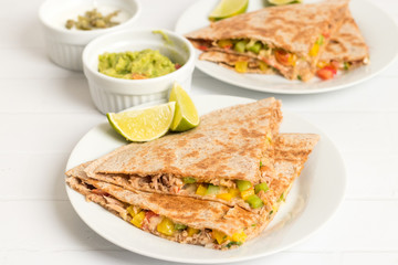Whole what quesadilla with tuna and vegetables.