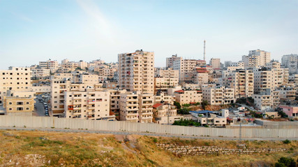 Palestinian Town Behind concrete Wall Aerial view Flying over Palestinian Town Shuafat Close to...