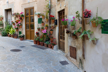 Valldemossa. Entrance door to the house decorated with flower pots