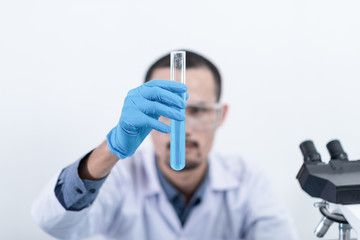 Naklejka premium Researcher in the laboratory Studying with chemicals And microscopes