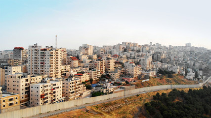Flying over Palestinian Town Shuafat Close to Jerusalem Drone footage  - obrazy, fototapety, plakaty