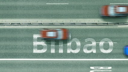 Overhead view of the busy car road with Bilbao text. Travel to Spain intro clip