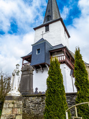 Historic Church of St. Peter in the village of Beho, Belgium, exterior partial view