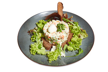 Olivier salad on a white background