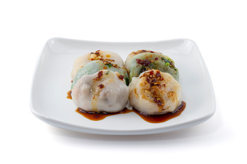 Steamed chives dumplings or Chinese chives dumplings with sauce isolated on white background