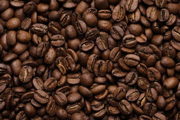 roasted coffee beans background. close up