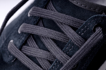 shoelace at modern sneaker shoe. close up.