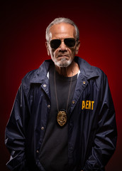 FBI Special Agent Detective looking serious, ready to apprehend the criminal.