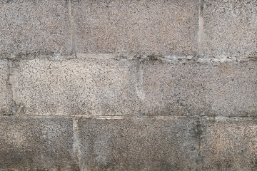 Old concrete block wall background and texture