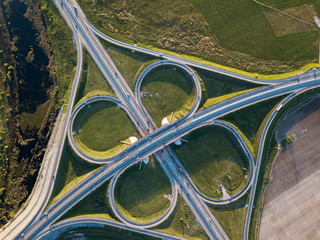 Summer aerial photo of transport junction, traffic cross road junction day view from above