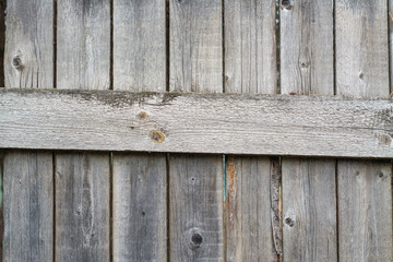 Background of old wooden planks fortified lying across the board