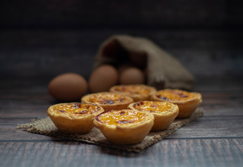 egg tart on a wooden background 