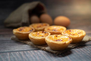 egg tart on a wooden background 