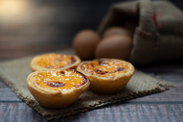 egg tart on a wooden background 
