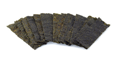 Crispy dried seaweed isolated on the white background