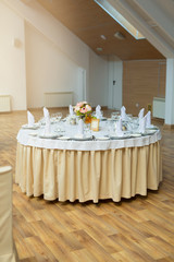 tableware standing on a white festive table