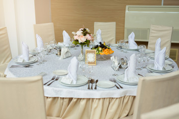 tableware standing on a white festive table