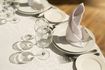 tableware standing on a white festive table