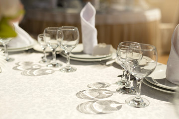 tableware standing on a white festive table
