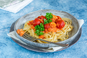 Chilli crab and cherry tomato linguine pasta