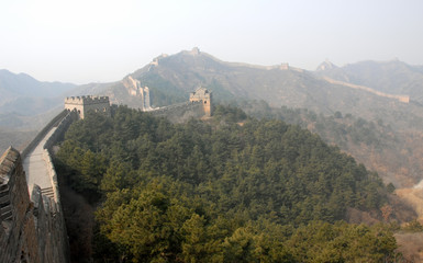 Obraz premium The Great Wall of China. This section of the Great Wall is Jinshanling, a wild part with scenic views. The Great Wall of China near Beijing. Wild Great Wall of China, Jinshanling, Beijing, UNESCO site