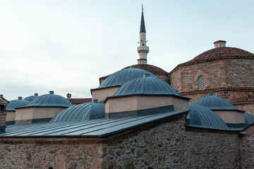 Fototapeta na wymiar Turkish Bath, Minaret in the Distance, Prizren, Kosovo
