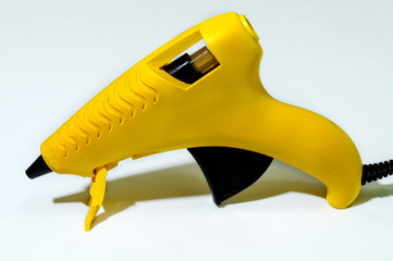 Electric hot glue gun isolated on white background