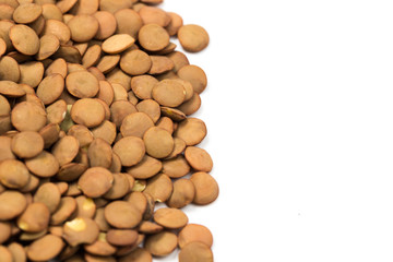 Pile lentil isolated on white background. Top view.