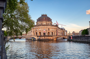 Fototapeta premium Berlin, Germany - May 4, 2019 - The Bode Museum located on Museum Island in the Mitte borough of Berlin, Germany at dusk.