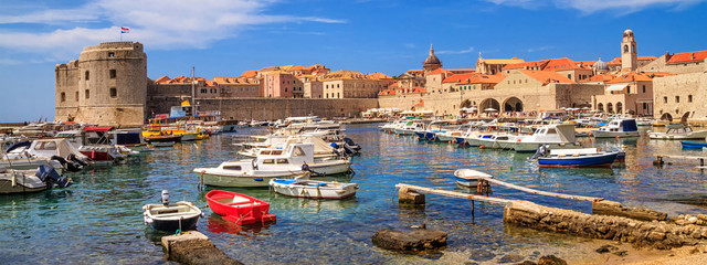 Coastal summer landscape, banner - view of the City Harbour and marina of the Old Town of Dubrovnik on the Adriatic coast of Croatia