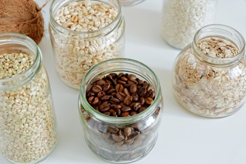 Various cereals, coffee, nuts, bran in glass jars. Zero waste concept, free plastic.