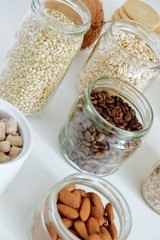 Various cereals, coffee, nuts, bran in glass jars. Zero waste concept, free plastic.