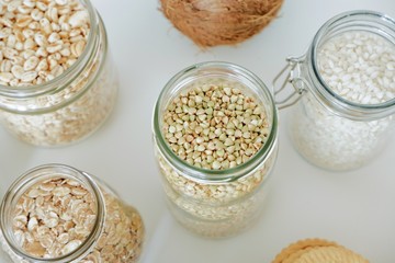 Various cereals, coffee, nuts, bran in glass jars. Zero waste concept, free plastic.