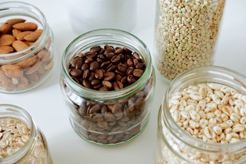Various cereals, coffee, nuts, bran in glass jars. Zero waste concept, free plastic.