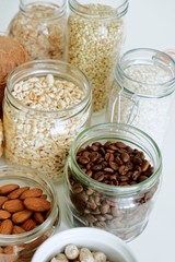 Various cereals, coffee, nuts, bran in glass jars. Zero waste concept, free plastic.